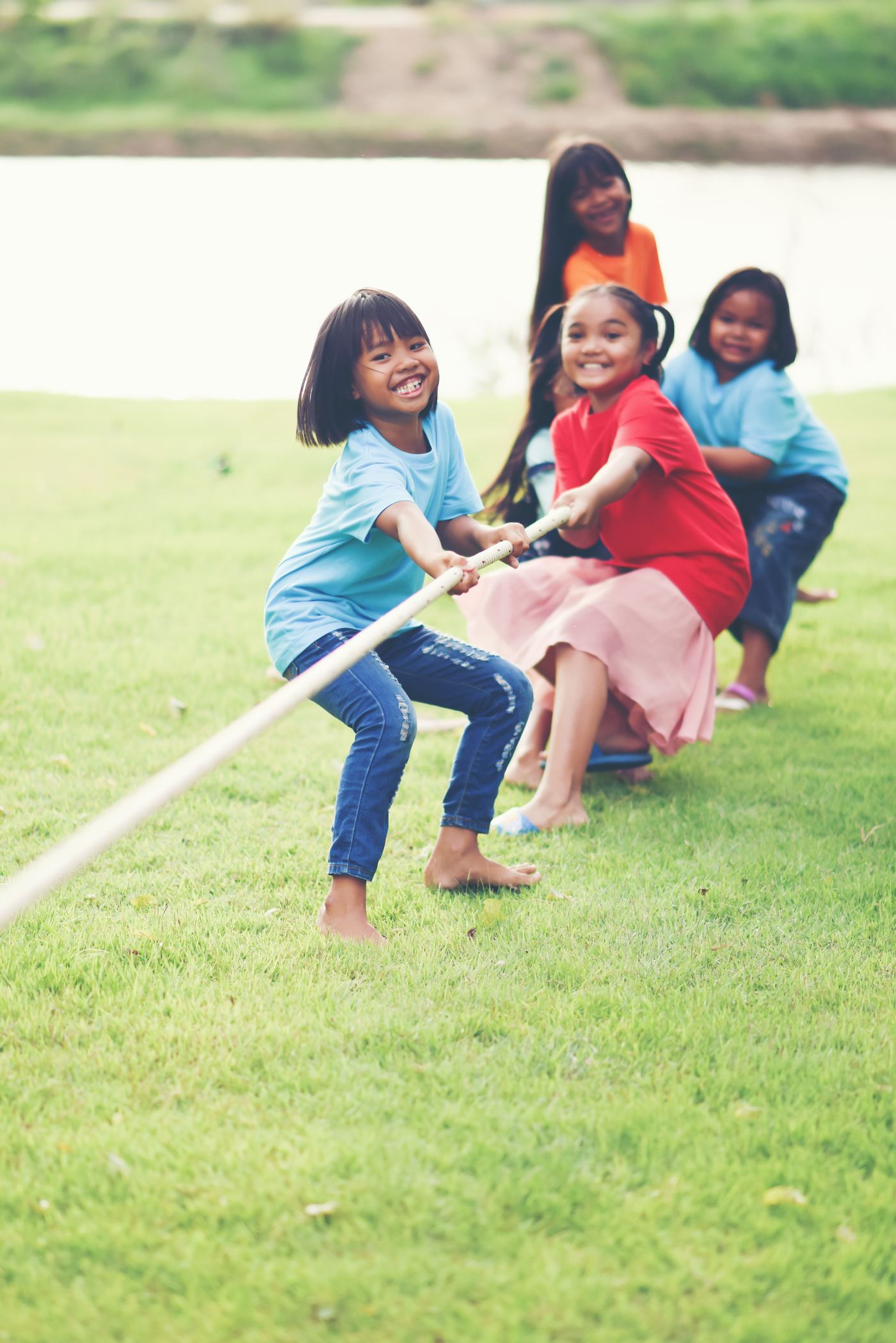Campers playing tug of war